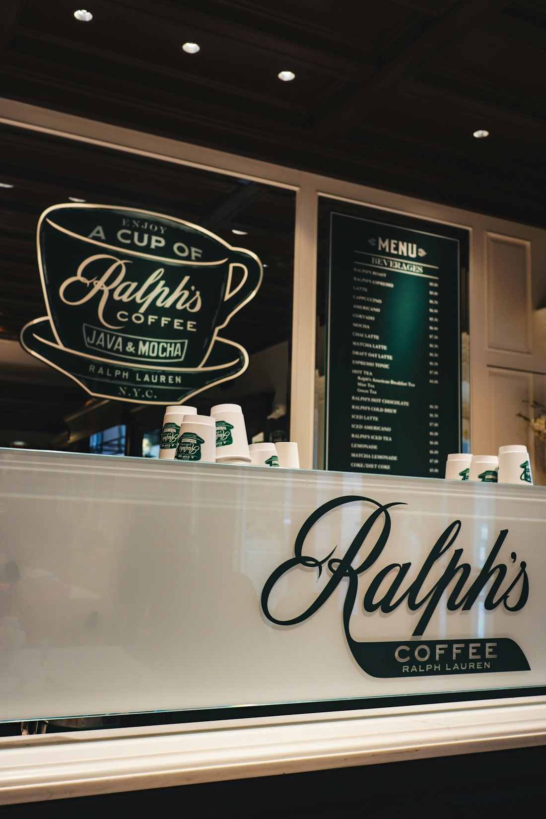 Ralph's coffee shop displays its menu and logo.