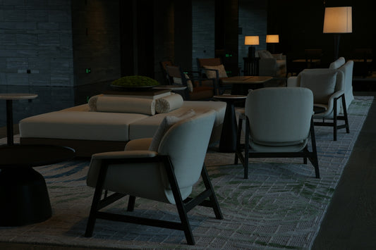 Modern lounge area with comfortable seating and lamps