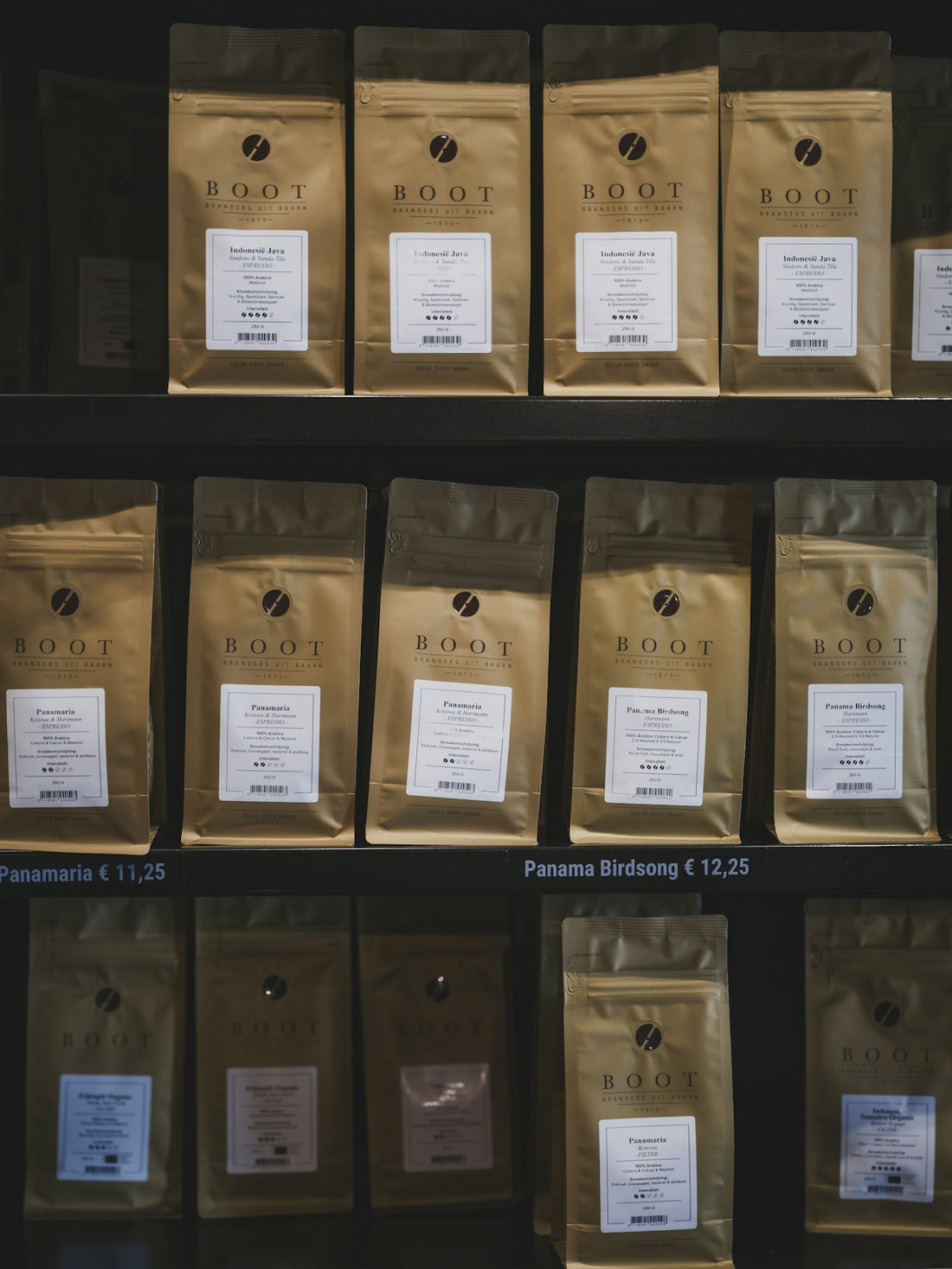 Bags of coffee beans on shelves