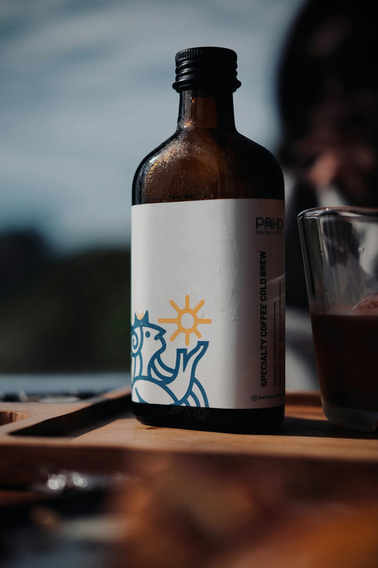 Specialty coffee cold brew in a glass bottle.