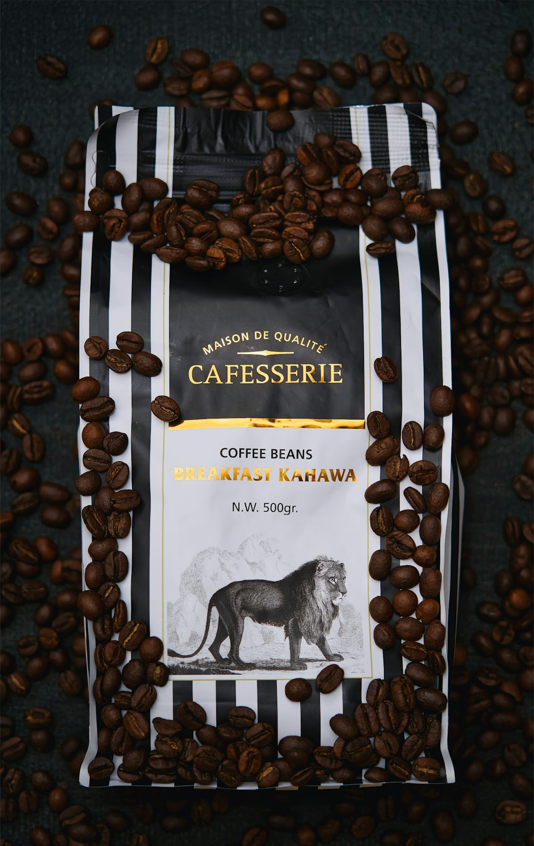 Bag of coffee beans with lion illustration.